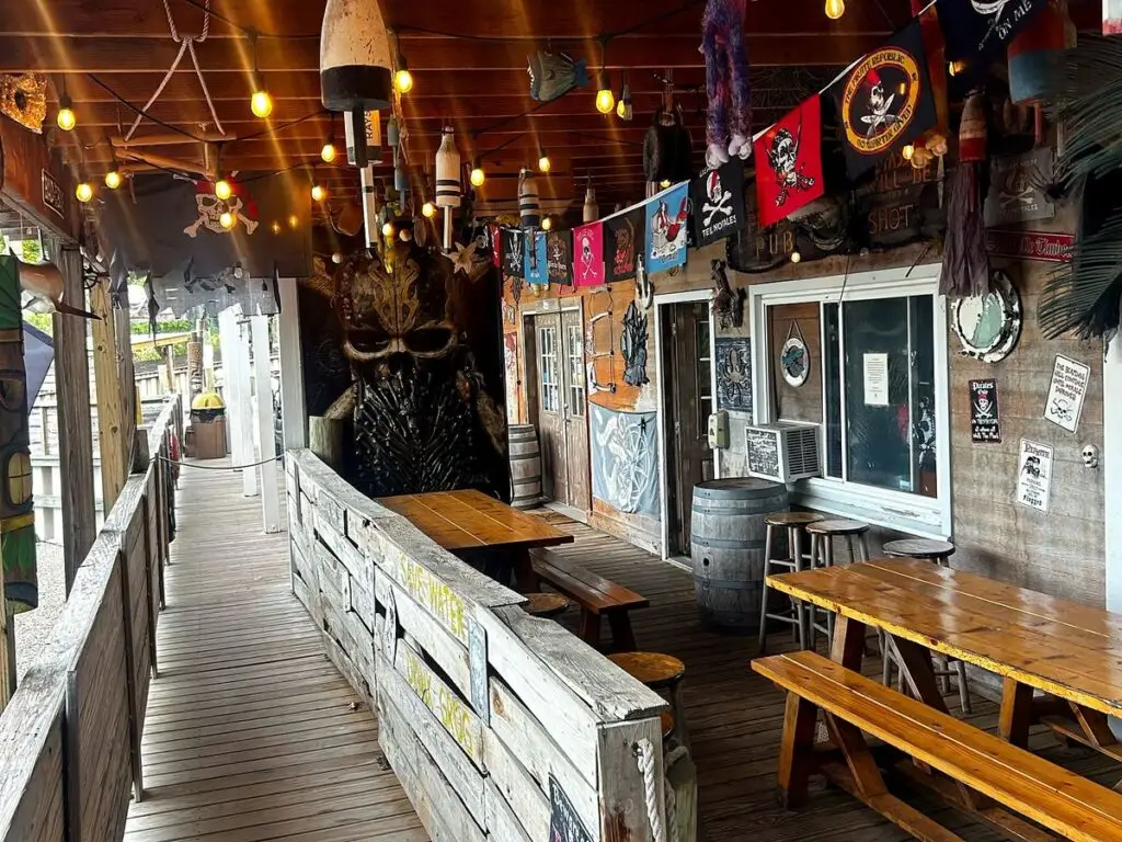 Pirate-themed covered deck with picnic tables for private pirate parties at Waterfront Marina, Brick